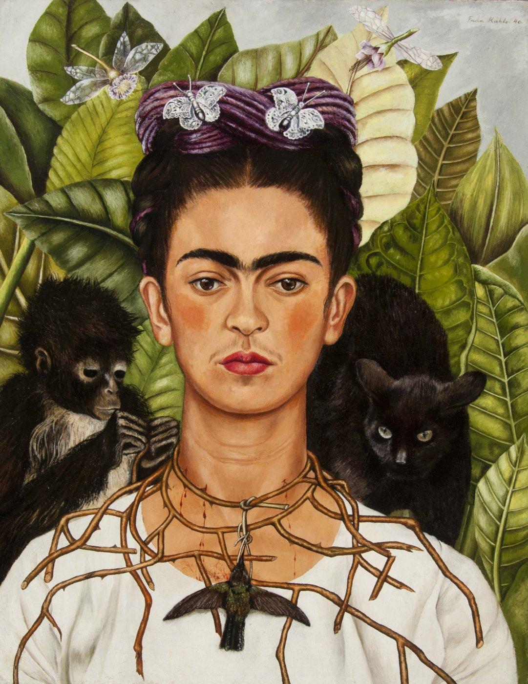 A painting of Frida Kahlo weaing a thorn necklace with a hummingbird pendant and a purple headdress adorned with butterflies. On her left shoulder is a black cat; on her right is a black monkey. The backdrop is a collection of lush green leaves.