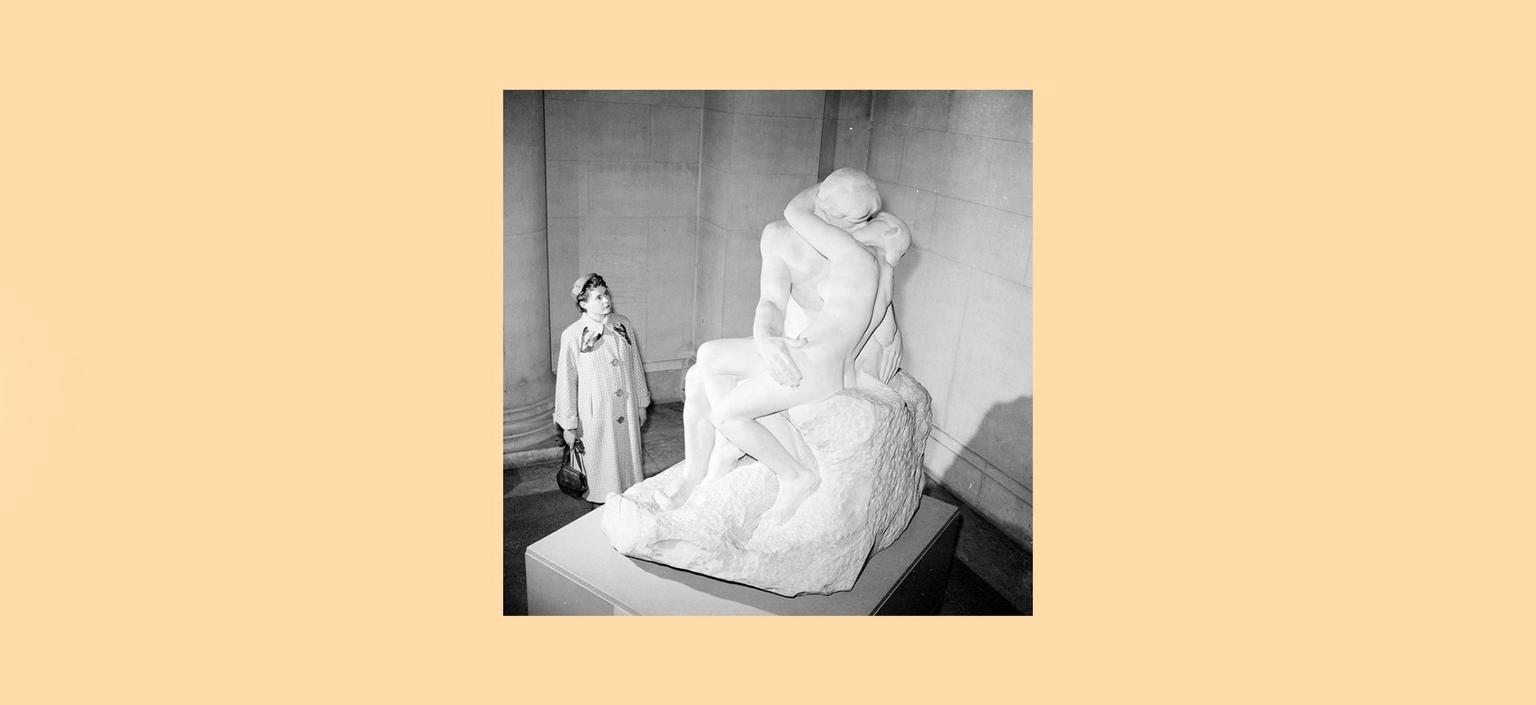 1955: A visitor to the Tate Gallery in London admires one of the three marble originals of Auguste Rodin's 'The Kiss' (Le Baiser). The statue's owner has announced plans to sell it to an American buyer unless the Tate can raise the sum of ?7,500, and with the help of the public, the gallery has achieved this total.