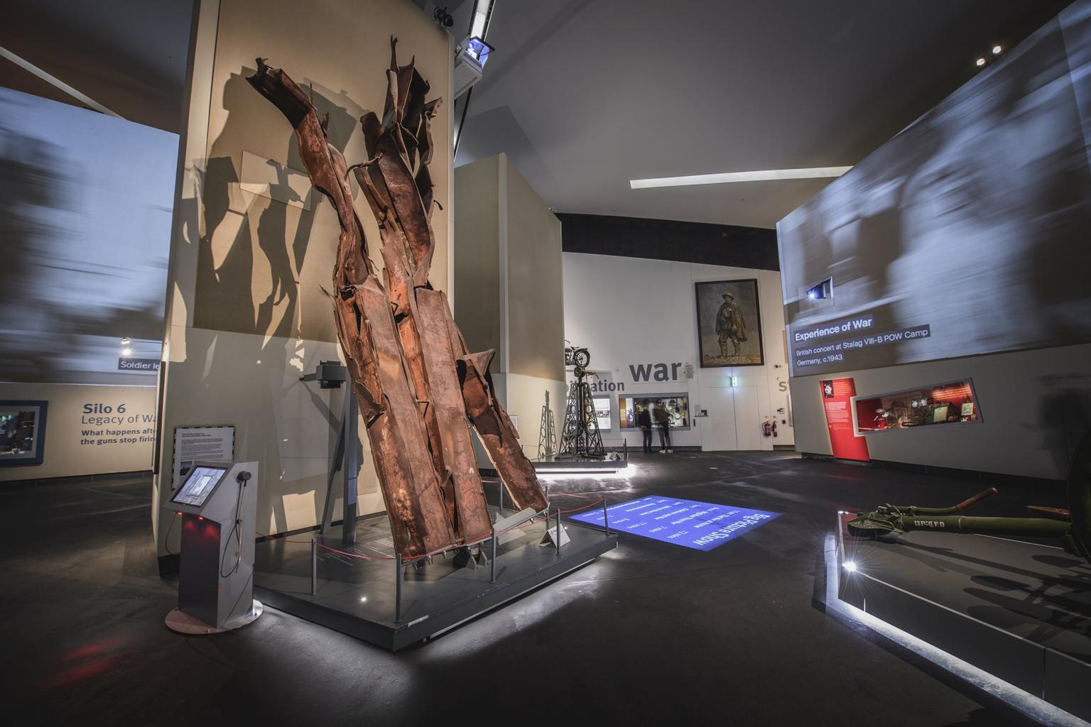 (l-r) Steelwork, World Trade Center (EPH 10364.1), Royal Horse Artillery 'E" Battery 13-Pounder Field Gun QF 13 pdr Mk 1 ( ORD 101) in the Main Exhibition Space at IWM North.Photographed 11th March 2022