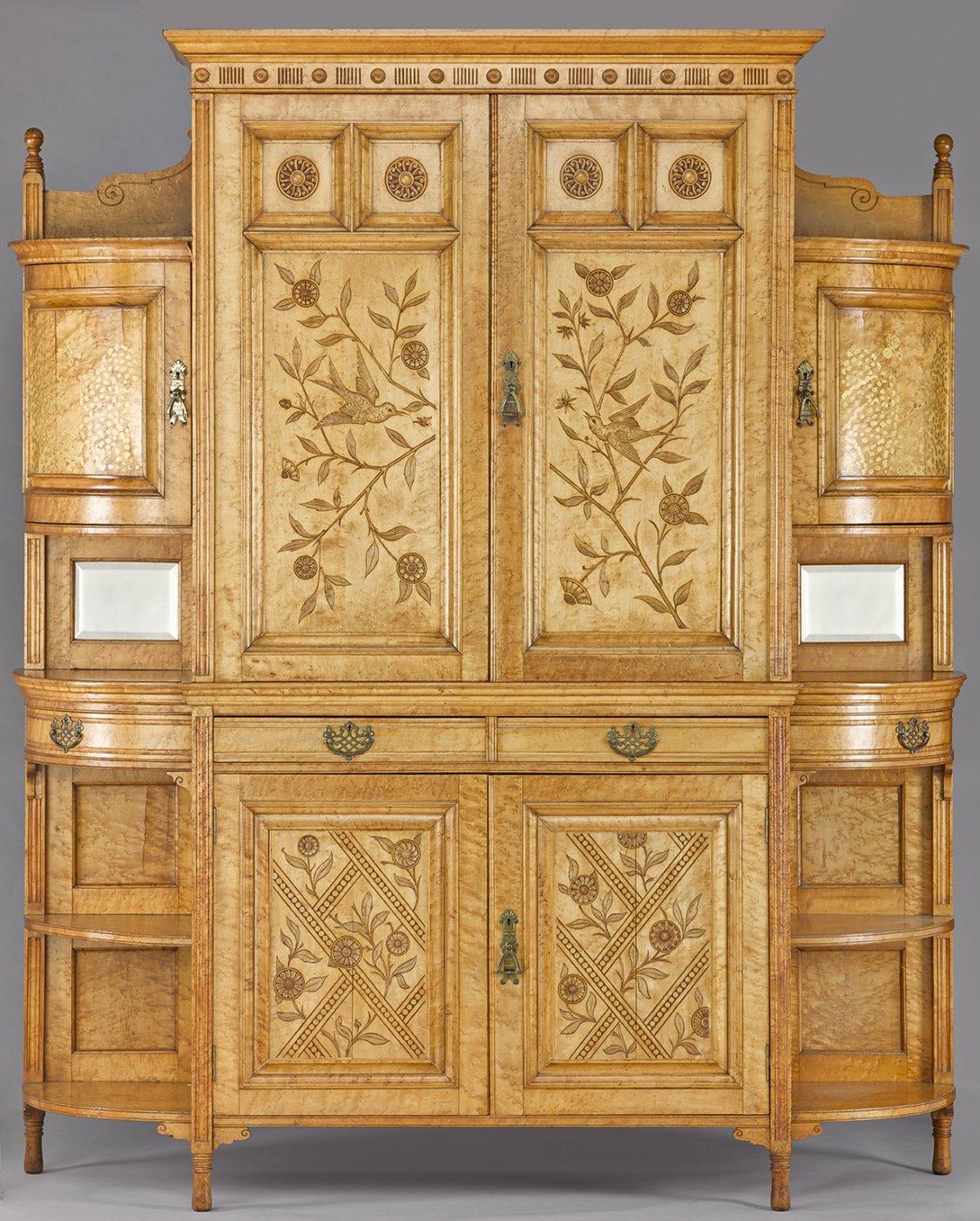 This cabinet is the result of an artistic collaboration between one of the most significant British designers of the 19th century and one of the greatest painters of the American Gilded Age. Designed by Edward William Godwin, a leading figure in the Aesthetic Movement, and painted by the Anglo-American artist James Abbott McNeill Whistler, the Cloud Cabinet is the only known piece of furniture made by the two to survive in its original state. It was manufactured by William Watt Art Furniture of London and features both William Watt's label and Whistler's distinctive butterfly signature. Created in the Anglo-Japanese style associated with Aestheticism, the cabinet is crafted from bird's-eye maple and brass. The decorations consist of intricate carvings - floral, bird and geometric motifs inspired by the art of Japan - and painting, with stippled clouds and golden butterflies. Surviving Godwin furniture from the late 1870s is very rare, and Whistler's decorations make this cabinet unique. It was almost certainly created for William Watt's stand at the 1878 'Exposition Universelle' in Paris. Whistler gave the piece its unusual title: as with his paintings, he named his design works after musical forms and colours.Harmony in Yellow and Gold - The Cloud Cabinet will be one of the centrepieces of the National Museum of Scotland's 'Designed for Life' gallery, opening in 2016 and exploring European and American design and the applied arts from 1851 to 1951.