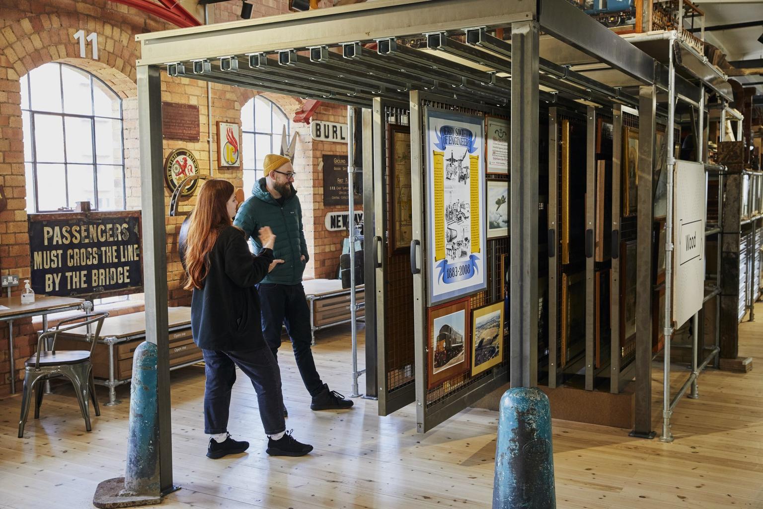 Two visitors look at displays inside the Museum of Making in Derby.