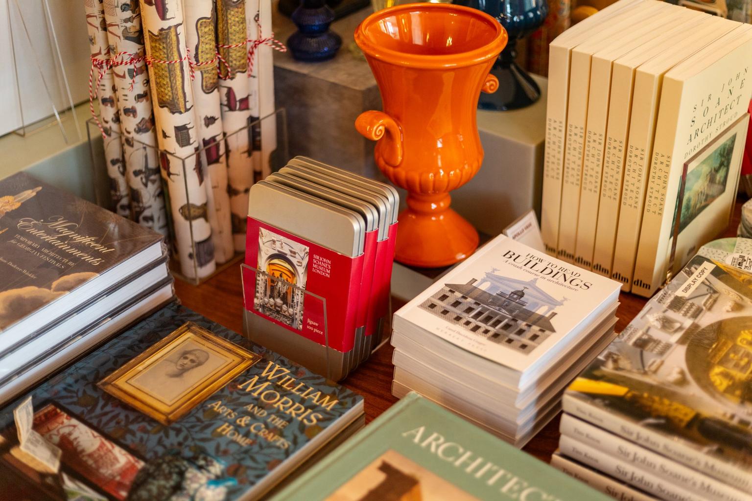 Books, wrapping paper and ornaments in a museum shop display