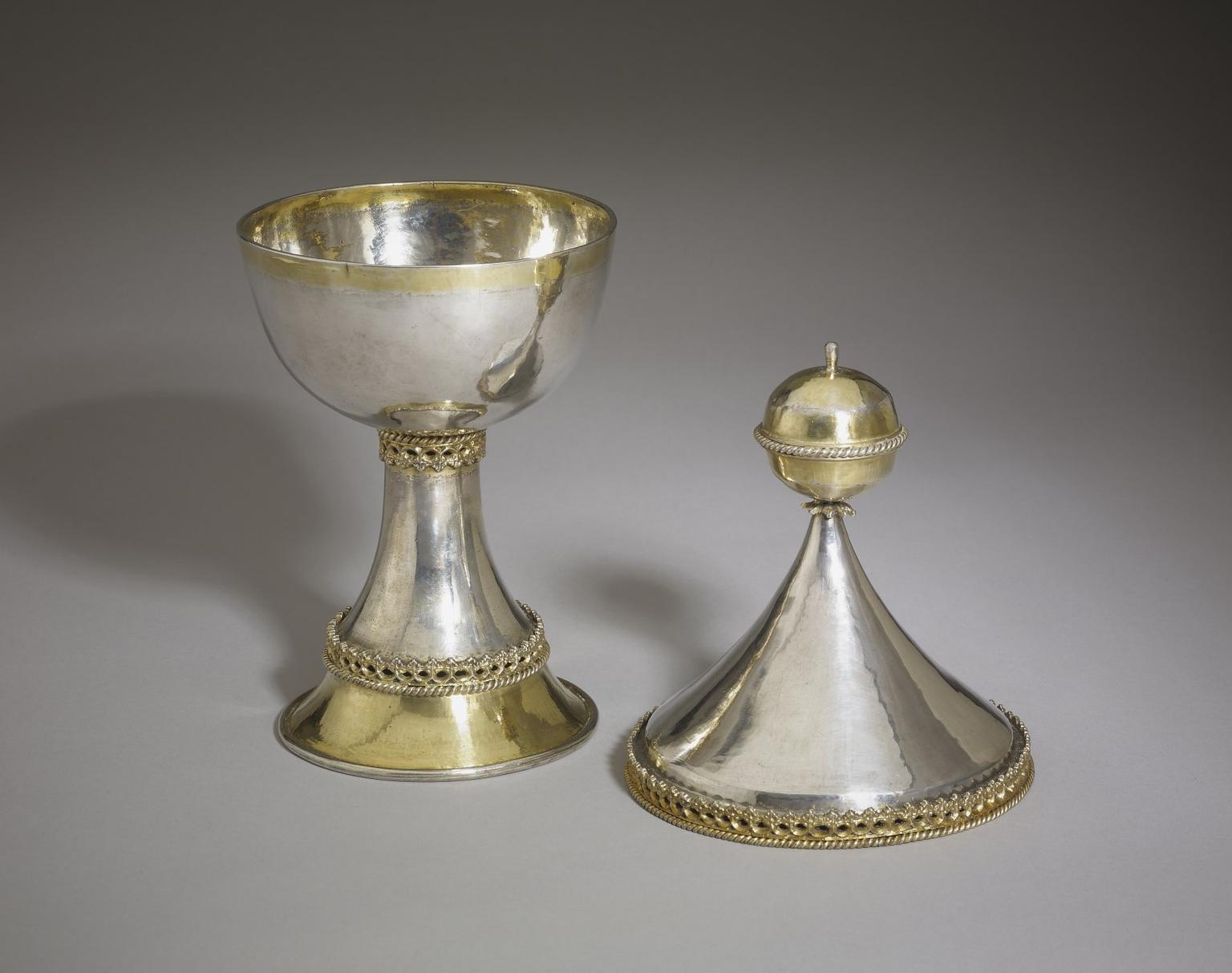 Created in the 15th century for communal drinking at feasts, this secular masterpiece of medieval silverwork was put to use as a church chalice after being donated to Saint Cyriac's in Lacock, the village in Wiltshire that gives the cup its name.Despite its secular origins, the design of the cup - foregoing religious images in favour of clean lines and Gothic patterning - gave it new life as a religious vessel following the Reformation. The newly formed Protestant church's hostility towards religious iconography made the cup a perfect chalice for use at Eucharist.While 'chalice-shaped' secular cups were popular in the late Middle Ages, most were destroyed as a result of changing fashions or to claim their value as bullion, making the Lacock cup a rare survivor. The quality of its craftsmanship is stunning and, despite centuries of use, it remains in near-perfect condition with no apparent alterations to its original exterior.The cup had been on long-term loan to the British Museum since 1962, forming the centrepiece of the museum's medieval displays, and until the 1980s it continued to be used for certain religious festivals at the church. This joint acquisition will give the British Museum greater flexibility to display the cup, as well as ensuring that it will be exhibited regularly at the Wiltshire Museum in Devizes, less than ten miles from Lacock.