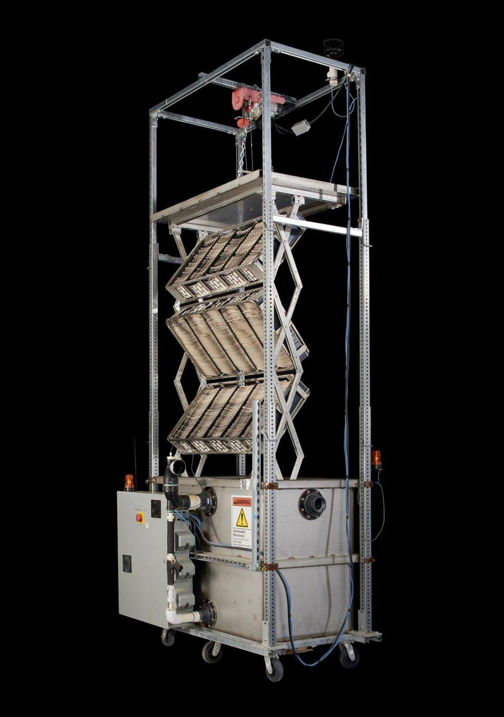 Group shot of 2021-0151 Tank, part of mechanical tree prototype for direct capture of carbon dioxide from the air, designed and built by Klaus Lackner’s team at the Center for Negative Carbon Emissions, Arizona State University, Tempe, Arizona, USA, 2017 and 2021-152 Gantry / frame, part of mechanical tree prototype for direct capture of carbon dioxide from the air, designed and built by Klaus Lackner’s team at the Center for Negative Carbon Emissions, Arizona State University, Tempe, Arizona, USA, 2017.