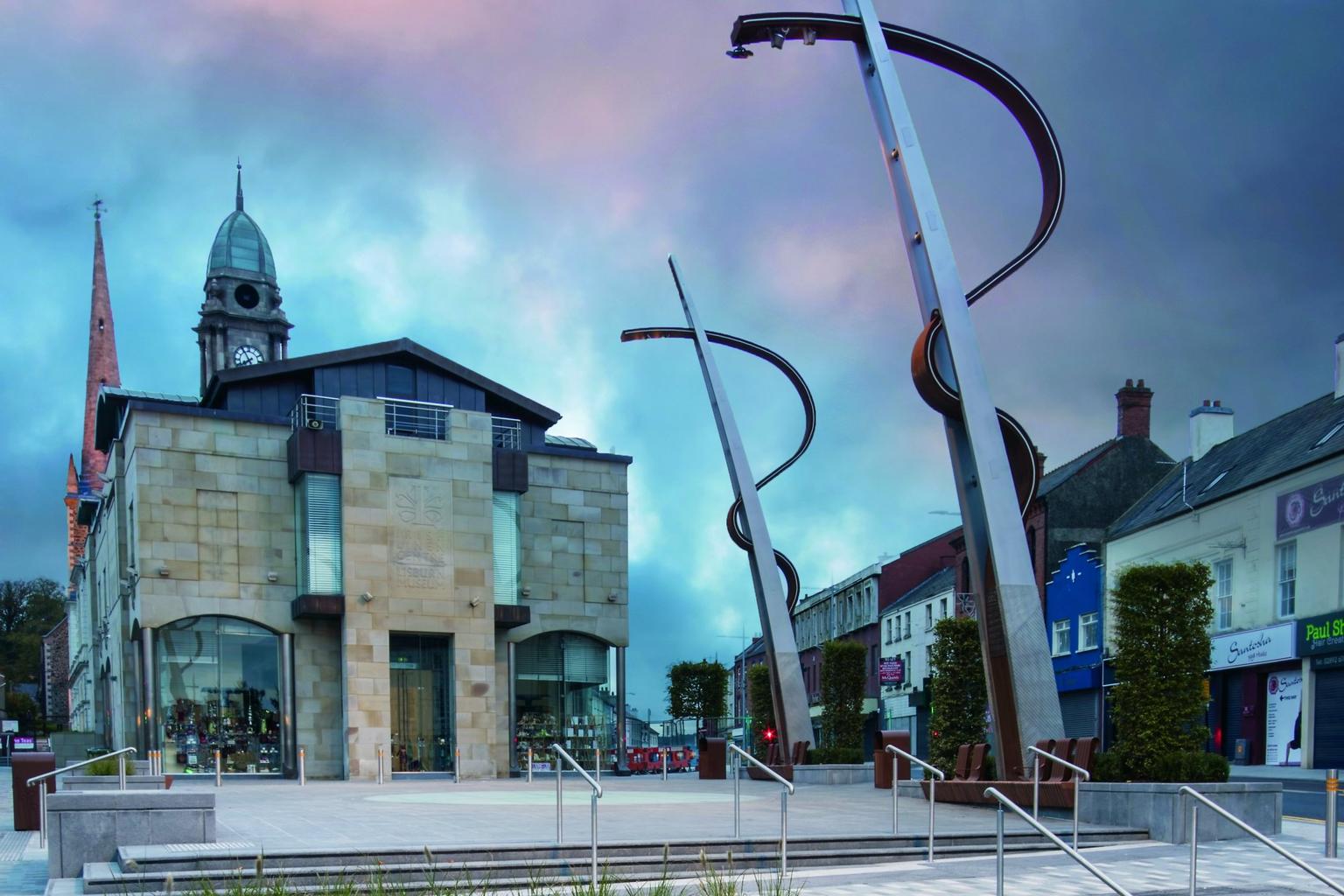 The exterior of the Irish Linen Museum, set agains an atmospheric sky