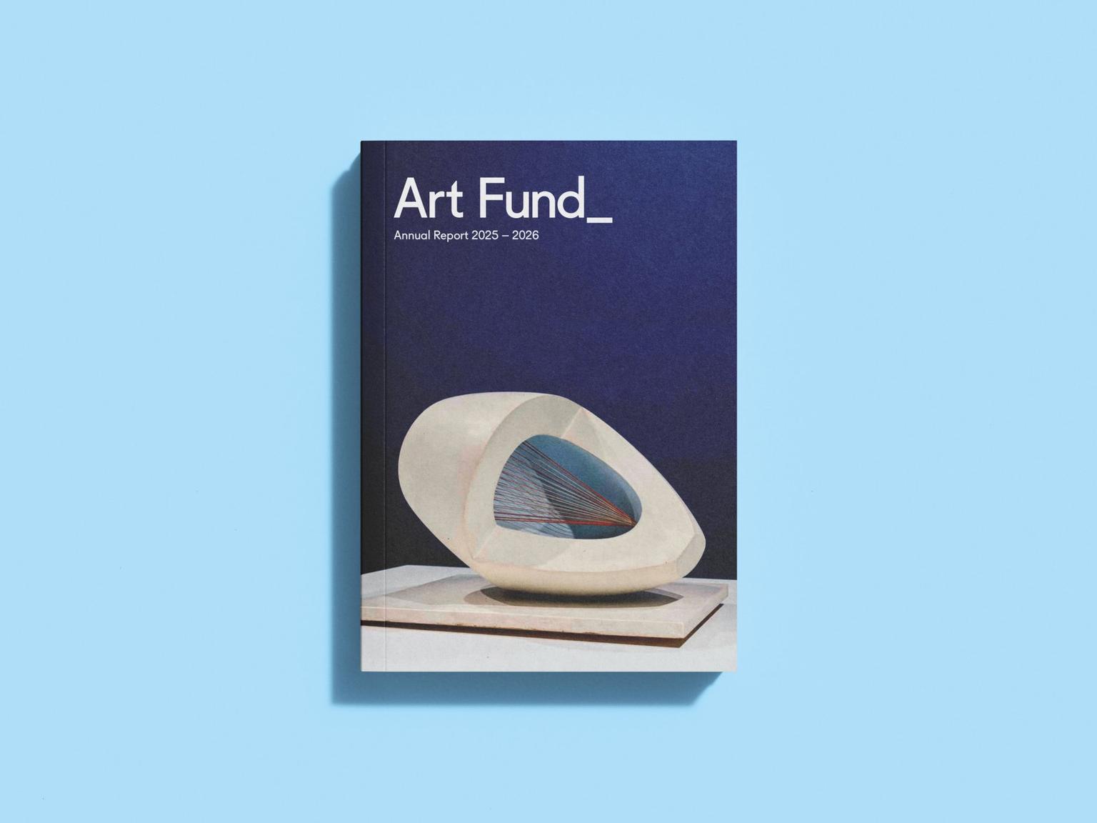 The navy blue cover of Art Fund's 2025-26 annual report, featuring a photograph of a white abstract sculpture with multicoloured strings on top of a plinth. The cover is set against a pale blue background.