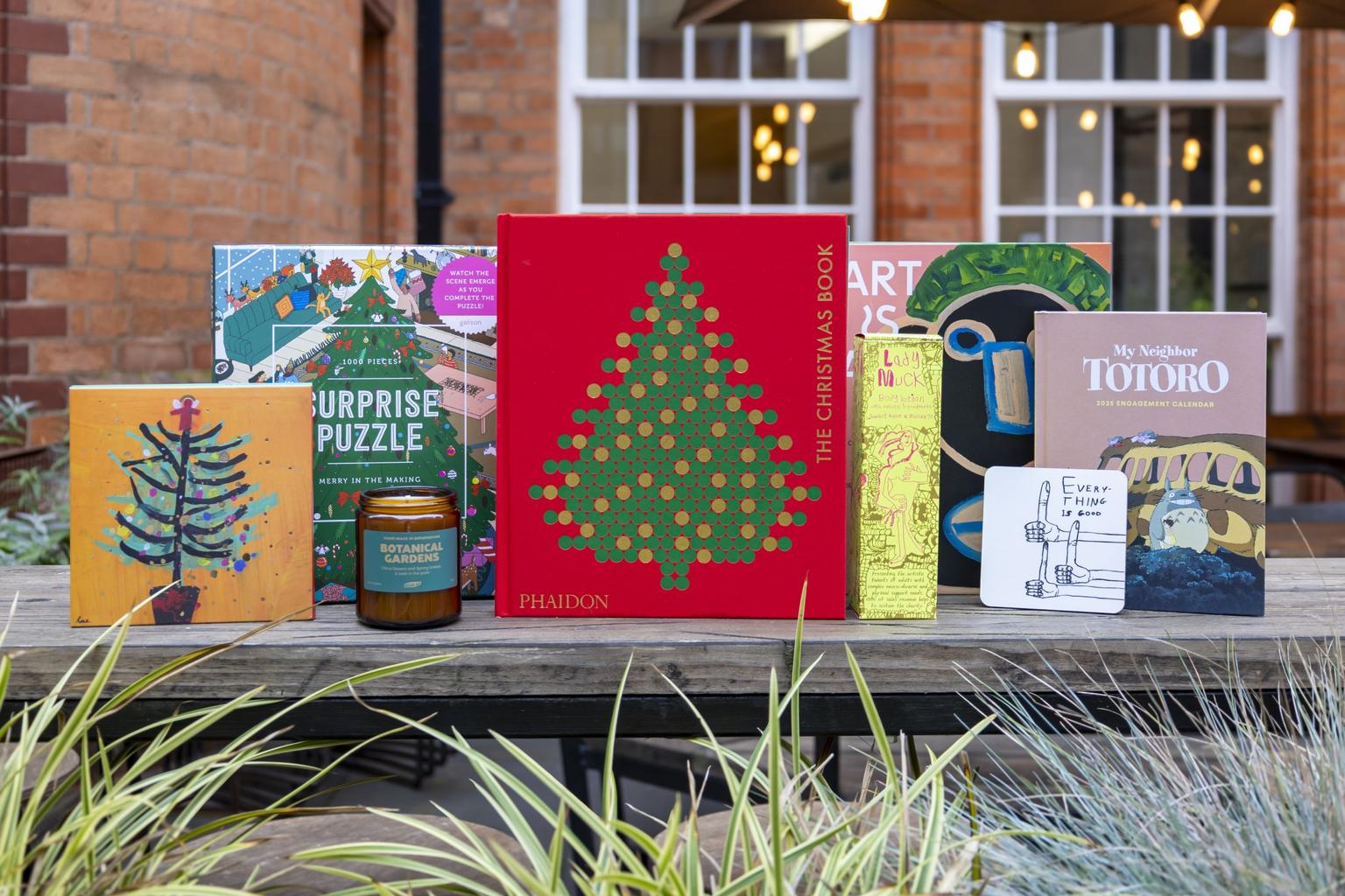 Christmas gifts including books, candles and cards