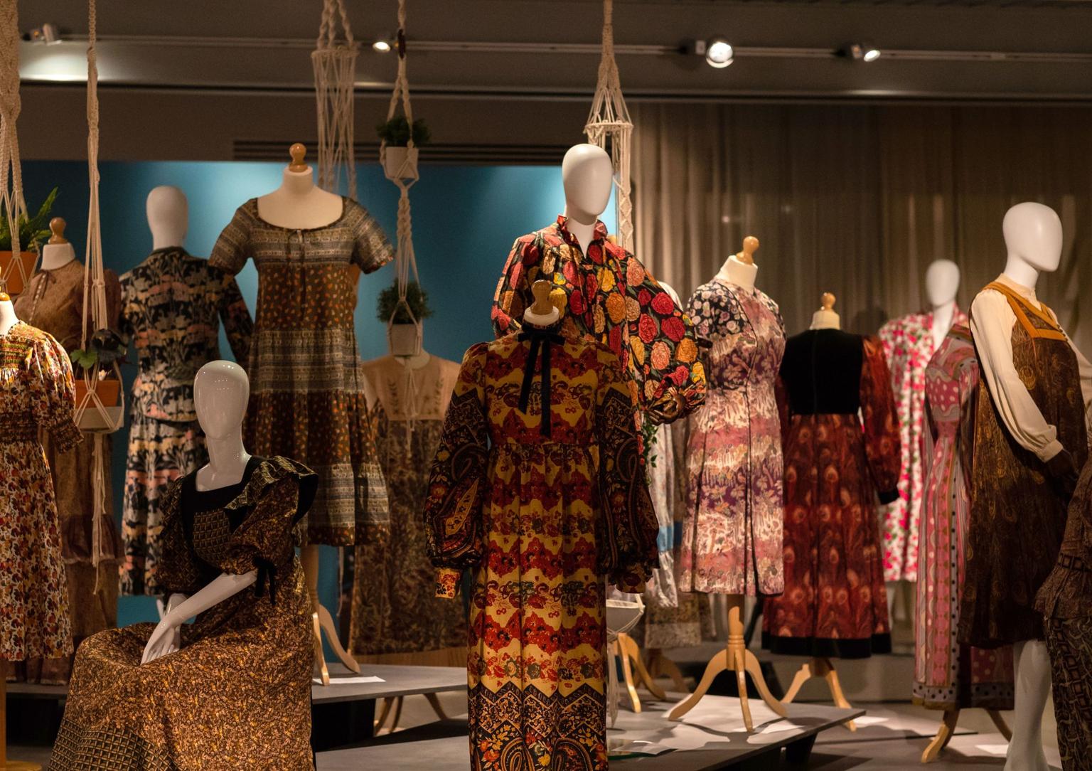 A collection of mannequins wearing Liberty print dresses