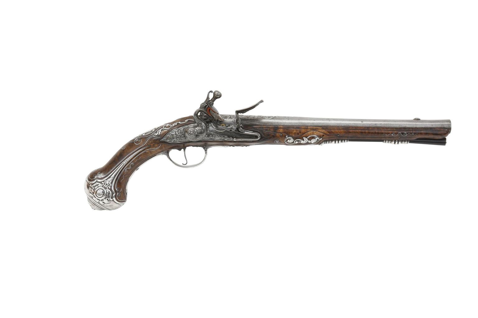 Flintlock pistol..English, London, about 1687..By Andrew Dolep....A silver mounted holster pistol. The escutcheon engraved with the cypher ‘IR’ for James II (reigning: 1685-1688). XII.12279