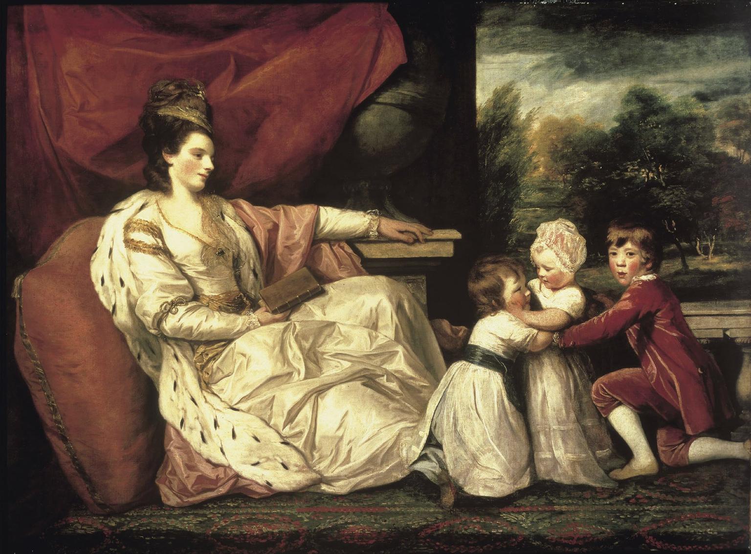 Lady Williams full length, reclining on a divan wearing oriental robes with her children playing beside her and a landscape beyond. This work was acquired with assistance from the Wolfson Foundation.