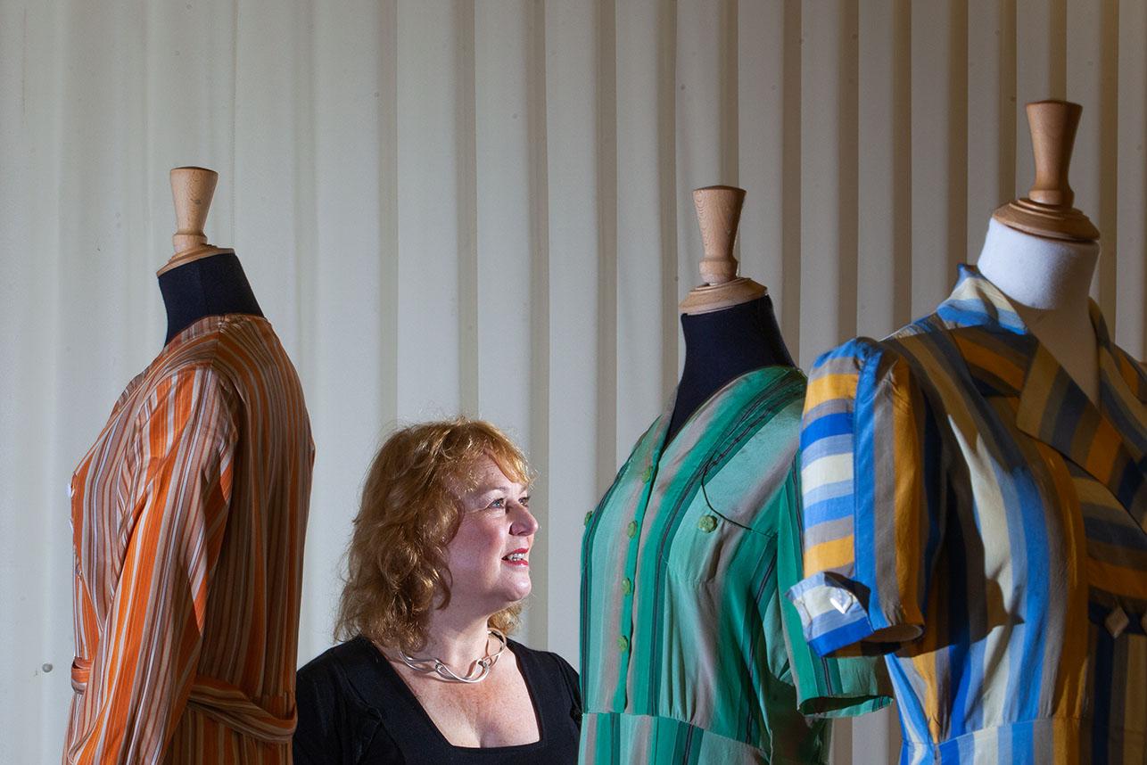 Emma Anderson, director of Macclesfield Museums, in the exhibition 'Macc Stripe' at Paradise Mill