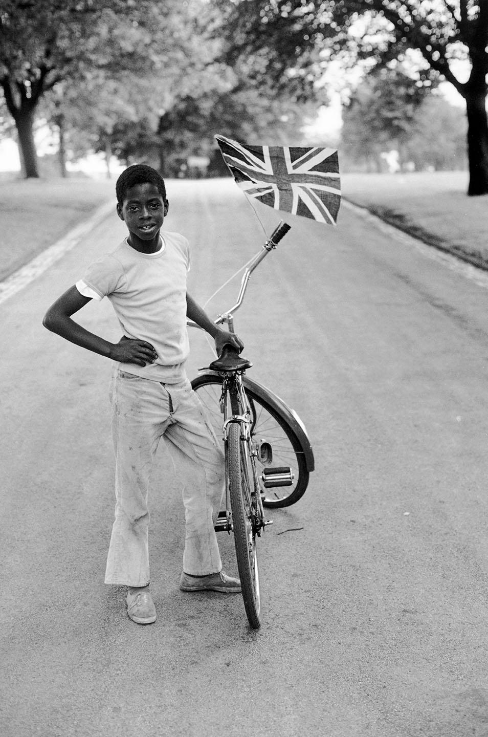 Vanley Burke, Boy with a Flag, Wilfred, in Handsworth Park 1970