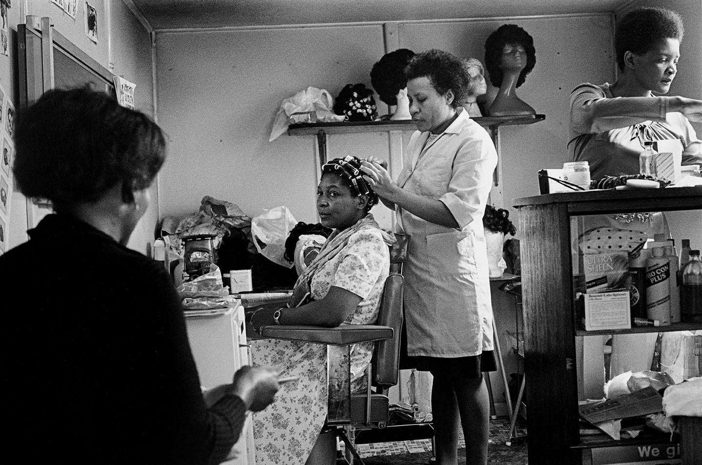 Vanley Burke, Mrs Walker and her customers at her hairdressers shop, Rookery Road, 1979