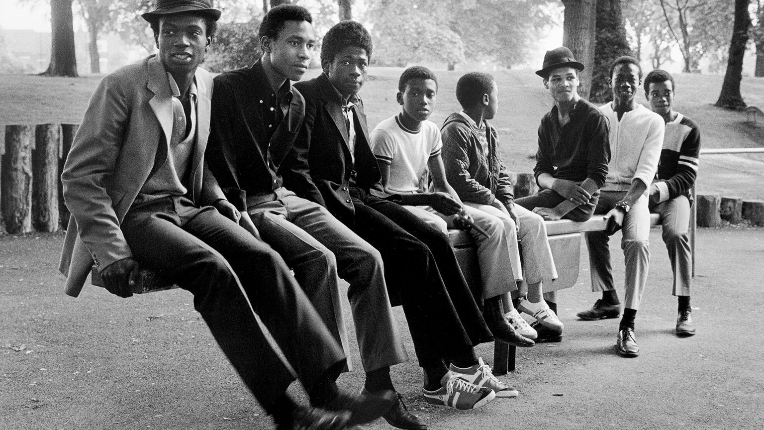 Vanley Burke, Young Men on a See-Saw in Handsworth Park, 1984