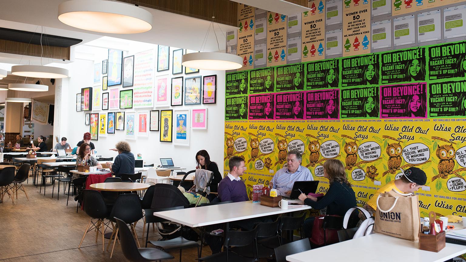 The café-bar at Chapter in Cardiff, with work by Magda Archer on the walls.